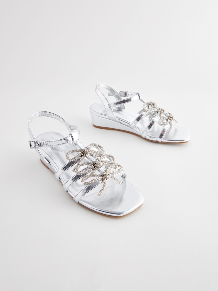 Silver Bow Wedge Sandals - Image 1 of 5