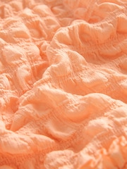 Apricot/Orange - Kleid mit 3D-Struktur (3–16 Jahre) - Bild 7 von 7