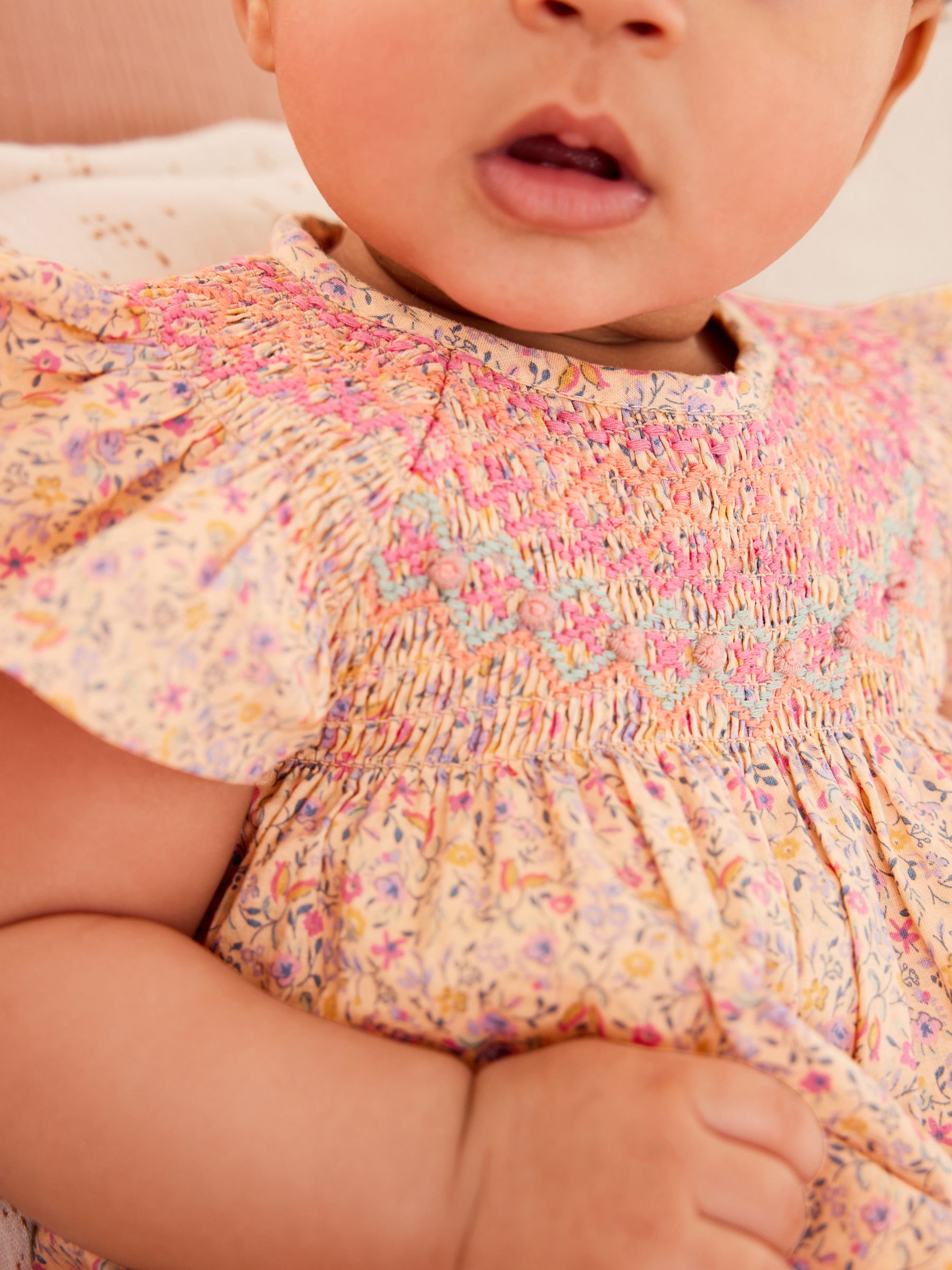Buy Pink Ditsy Floral Print Baby Romper (0mths-2yrs) from Next Oman