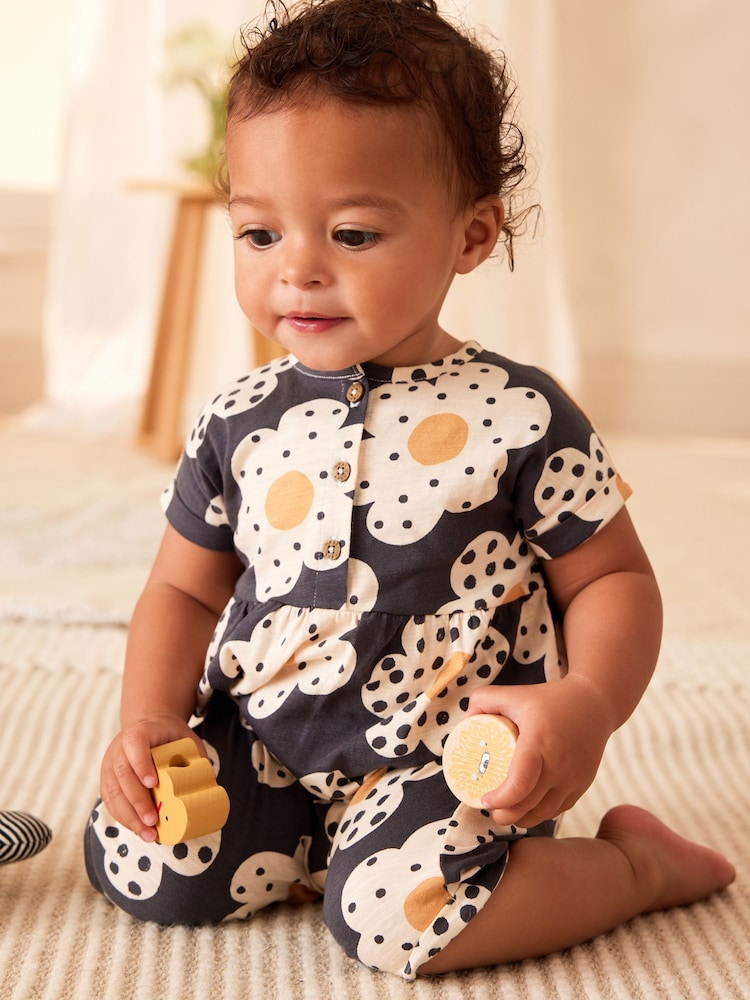 Monochrome Flower Print Baby Short Sleeve Wide Leg Jumpsuit (0mths-3yrs) - Image 2 of 10 Monochrome Flower Print Baby Short Sleeve Wide Leg Jumpsuit (0mths-3yrs) - Image 2 of 10