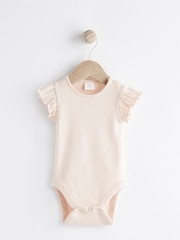 Grüne gestickte Blumen - Baby-Set aus kurzärmligem Oberteil und Latzhose (0–2 J.) - Bild 2 von 8
