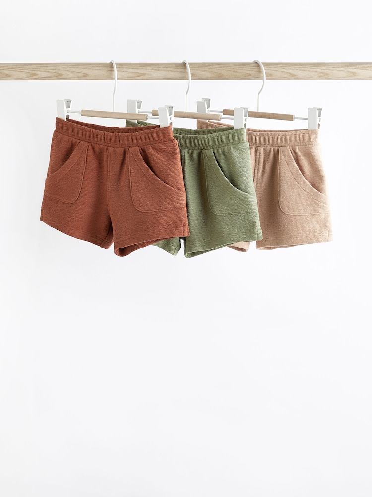 Rust Brown/ Khaki Green 100% Cotton Textured Baby Shorts 3 Pack - Image 1 of 7 Rust Brown/ Khaki Green 100% Cotton Textured Baby Shorts 3 Pack - Image 1 of 7