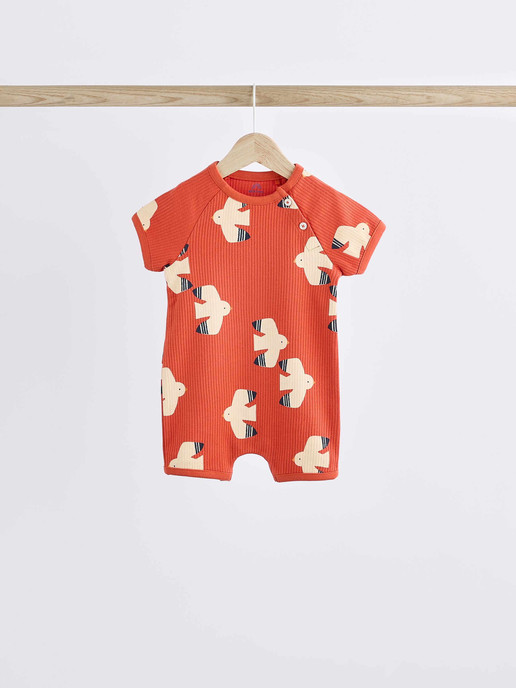Buy Bright Beach Character Baby Jersey Rompers 3 Pack from Next Luxembourg