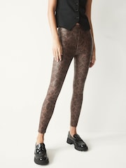 Snake Print Coated Sculpting Jeggings - Image 1 of 3