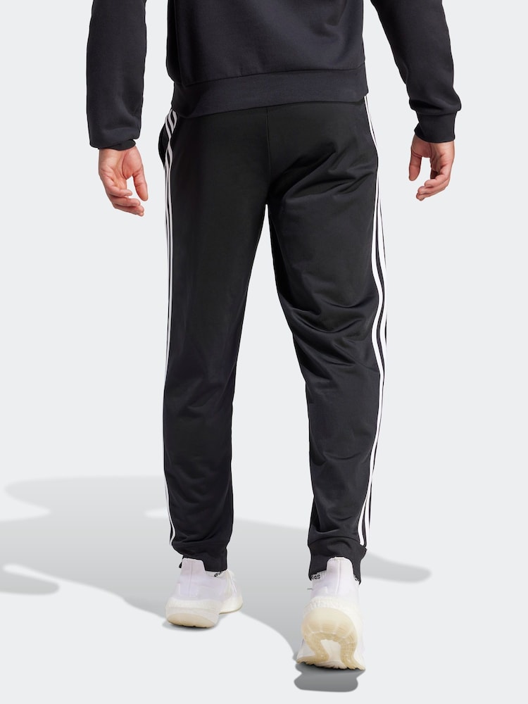 أسود داكن - بنطلون رياضي أضيق من أسفل 3 خطوط من Adidas - صورة 2 من 6