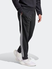 أسود داكن - بنطلون رياضي أضيق من أسفل 3 خطوط من Adidas - صورة 3 من 6