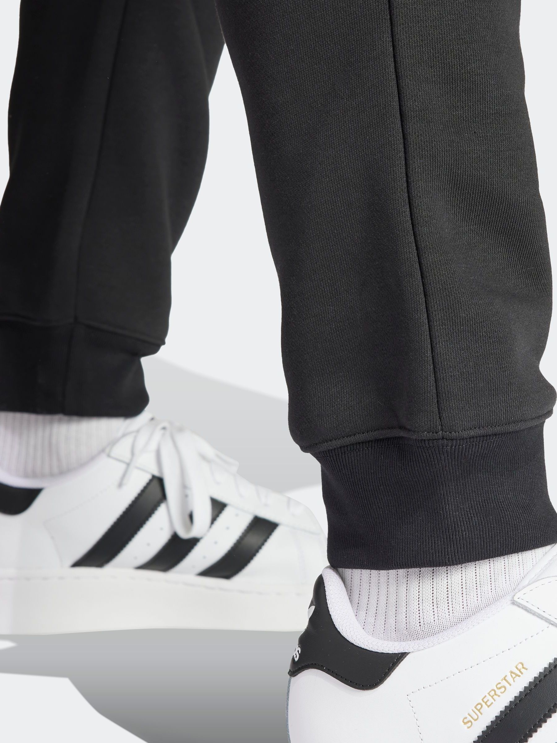 Buy adidas Originals Black Trefoil Essentials Joggers from Next Germany