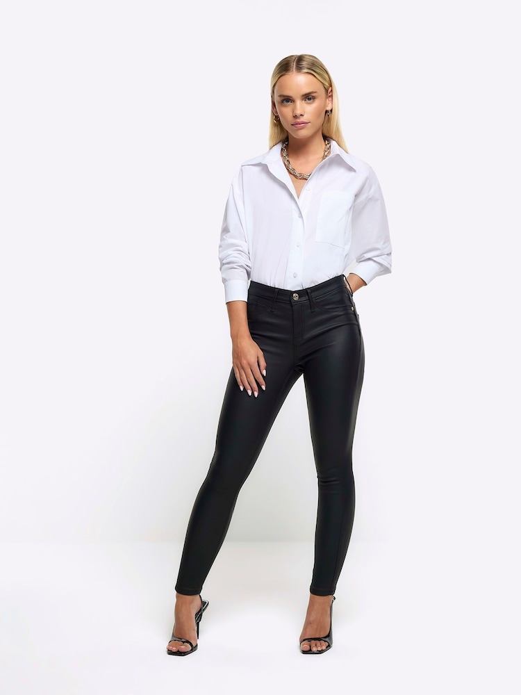River Island Black Petite Mid Rise Bum Scuplt Coated Skinny Jeans - Image 1 of 4