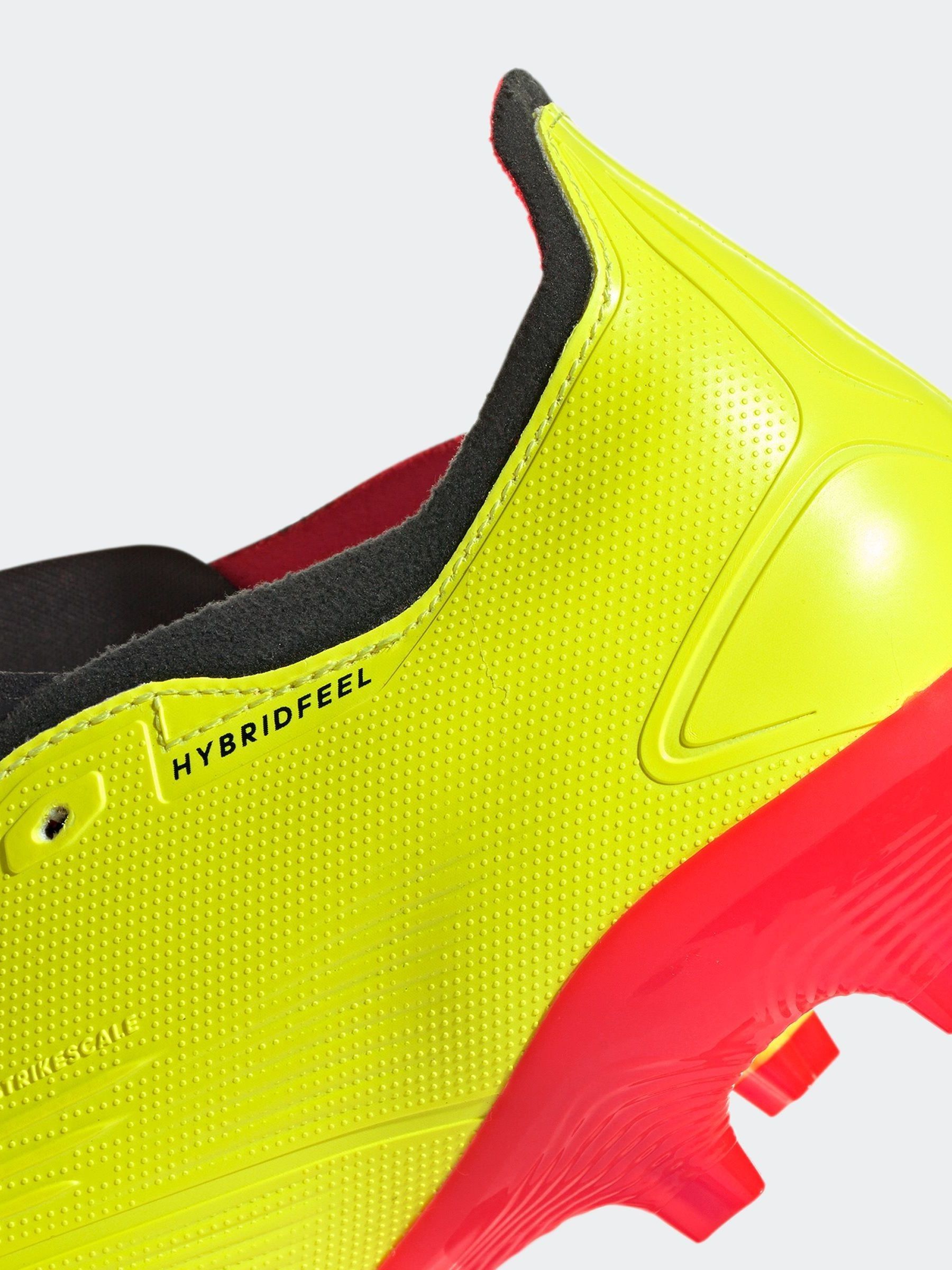 Yellow football boots on sale