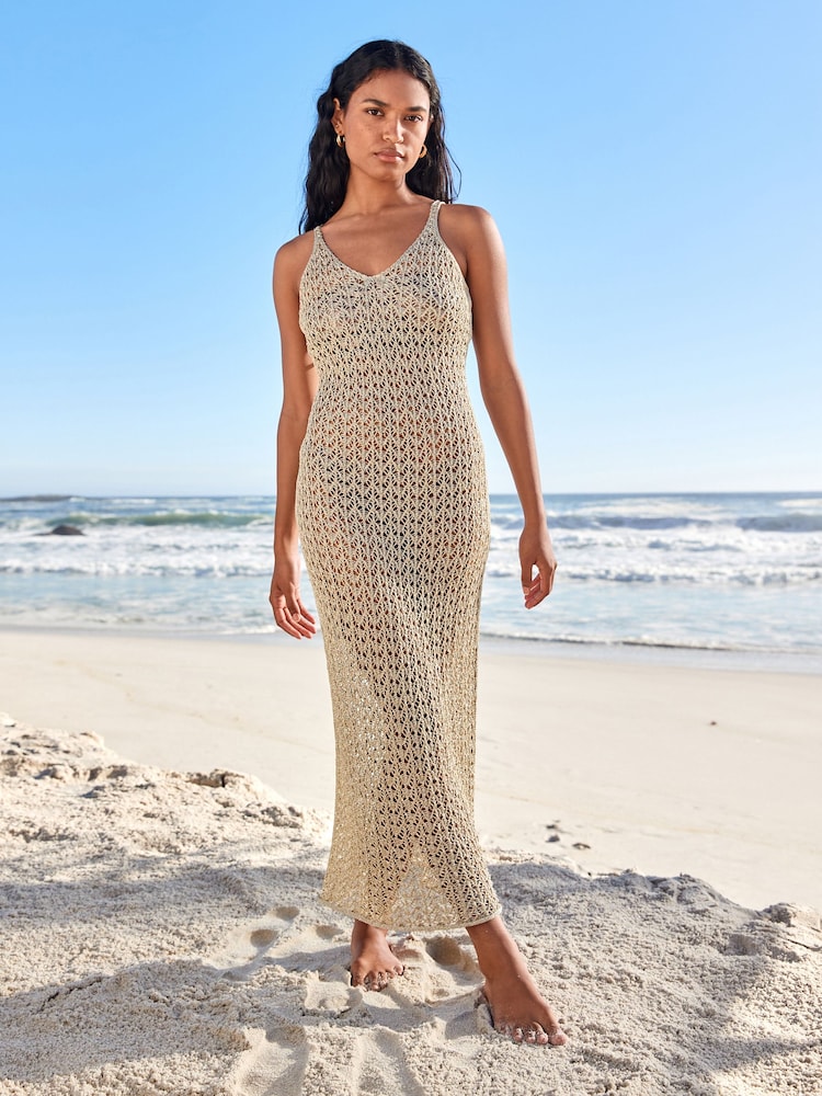 Gold - Metallic Strickkleid - Bild 1 von 4 Gold - Metallic Strickkleid - Bild 1 von 4