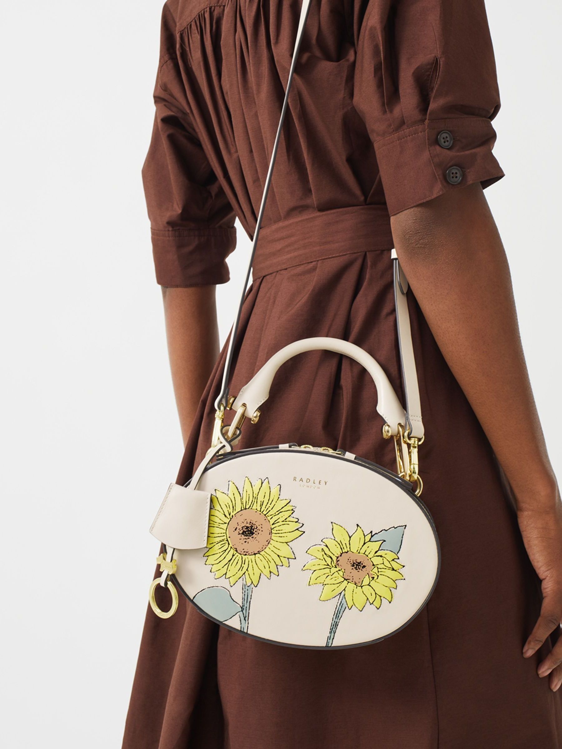 Buy Radley London Cream Basil Street Sunflowers Small Zip Around Grab Bag from Next Luxembourg