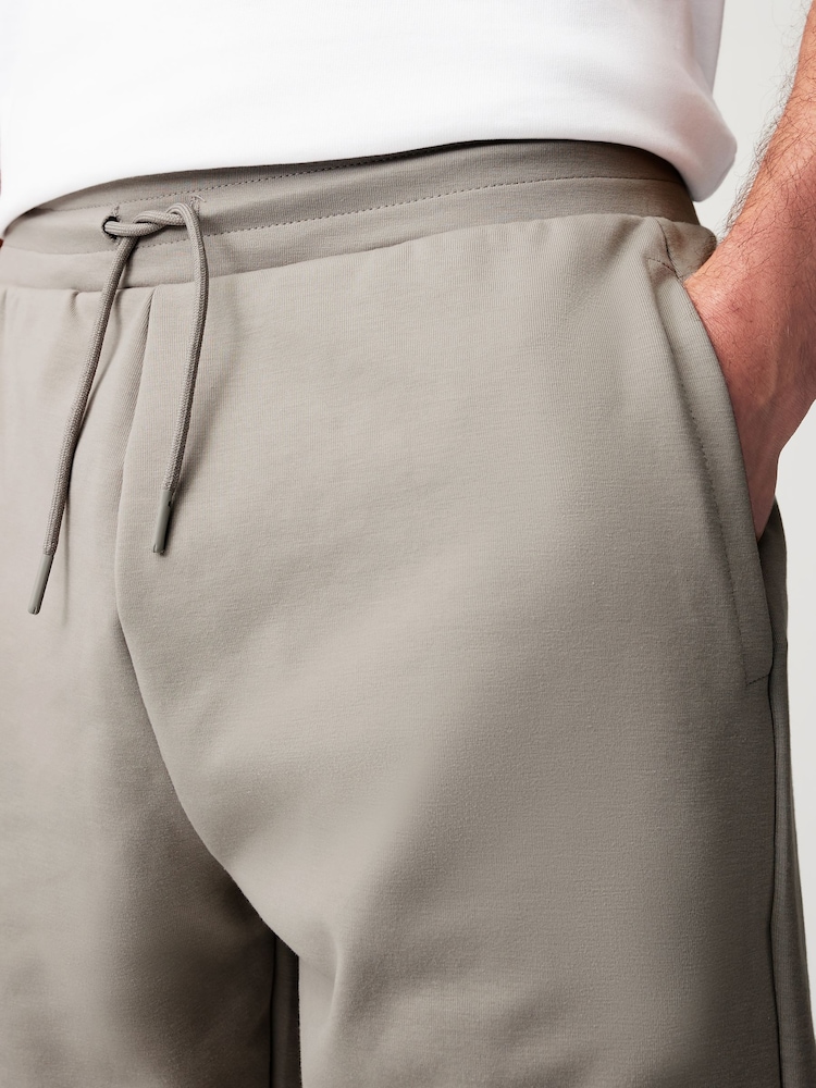 Grau - Gerade Passform - Jersey-Shorts mit Reißverschlusstaschen - Image 4 of 9