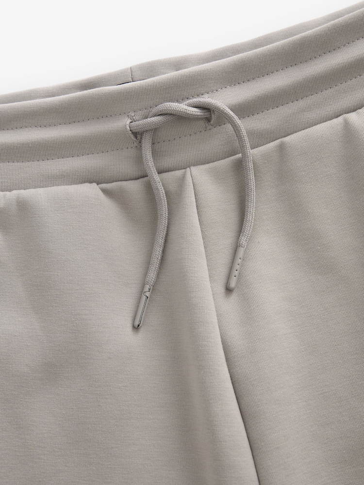 Grau - Gerade Passform - Jersey-Shorts mit Reißverschlusstaschen - Image 7 of 9