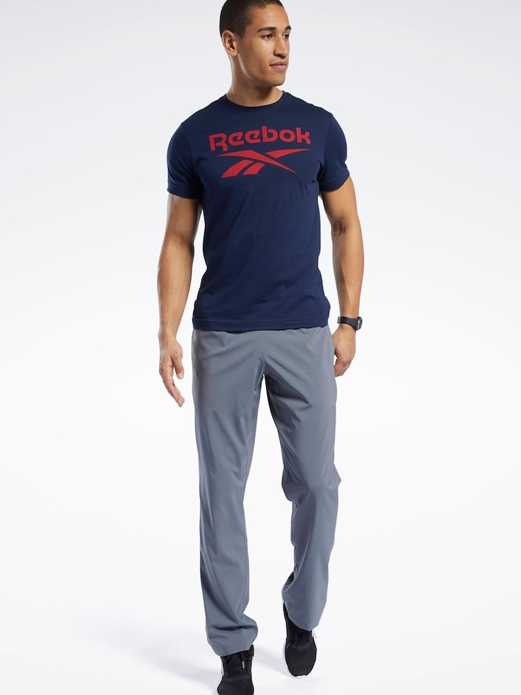 Reebok Frey Training Essentials Woven Unlined Joggers - Image 1 of 4 Reebok Frey Training Essentials Woven Unlined Joggers - Image 1 of 4