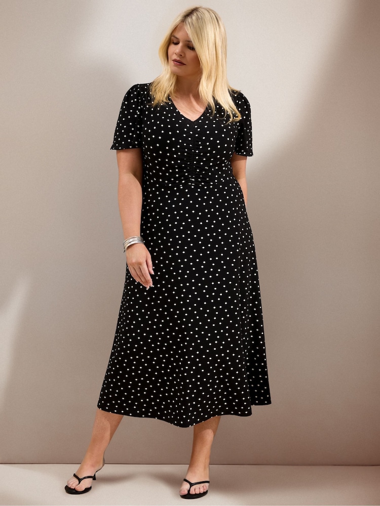 Live Unlimited Black Polka Dot Print Jersey Short Sleeve Midi Dress - Image 1 of 6 Live Unlimited Black Polka Dot Print Jersey Short Sleeve Midi Dress - Image 1 of 6