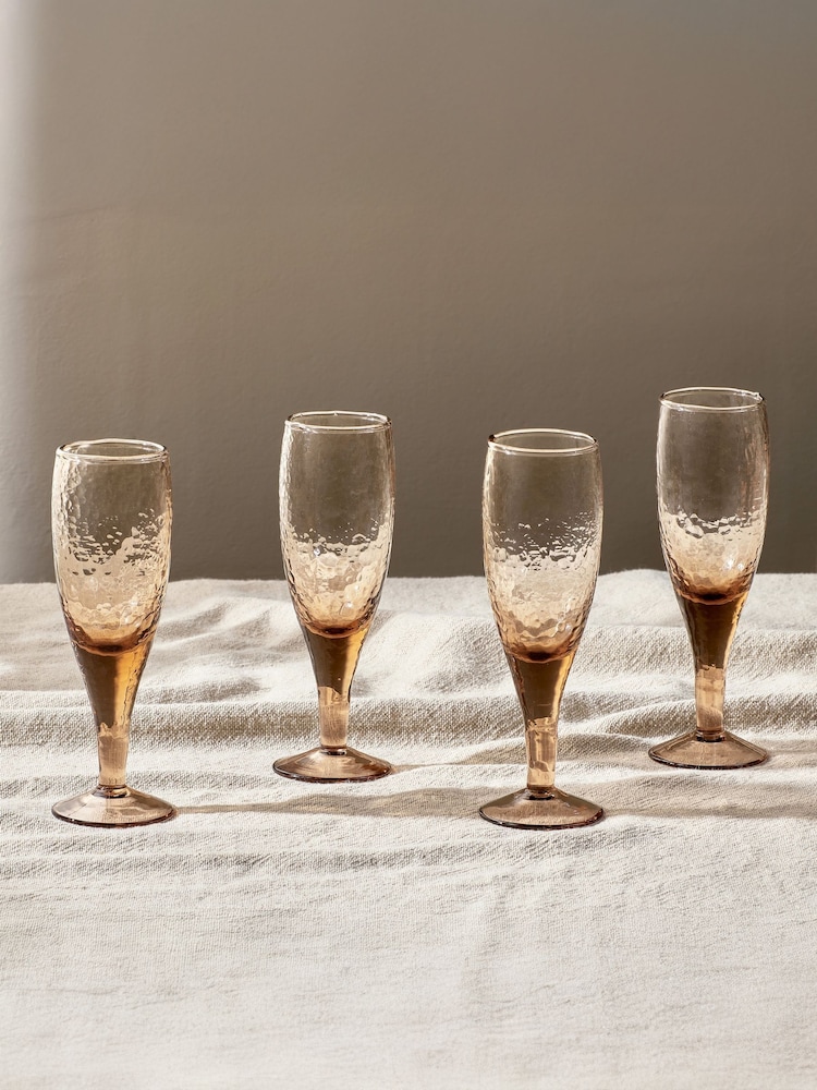 Nkuku Set of 4 Dusty Terracotta Yala Hammered Champagne Glasses - Image 1 of 3 Nkuku Set of 4 Dusty Terracotta Yala Hammered Champagne Glasses - Image 1 of 3