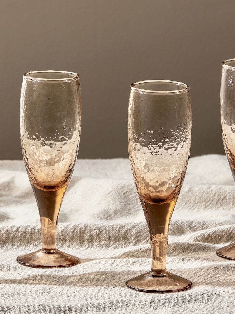 Nkuku Set of 4 Dusty Terracotta Yala Hammered Champagne Glasses - Image 2 of 3 Nkuku Set of 4 Dusty Terracotta Yala Hammered Champagne Glasses - Image 2 of 3