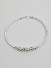 Simply Silver Silver Tone Love Knot Textured Bangle Bracelet - Image 1 of 3