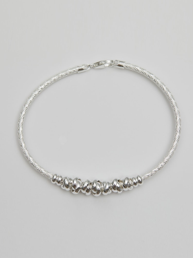 Simply Silver Silver Tone Love Knot Textured Bangle Bracelet - Image 1 of 3