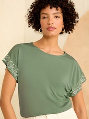 Love & Roses Green Sequin Cuff Jersey Top - Image 1 of 4