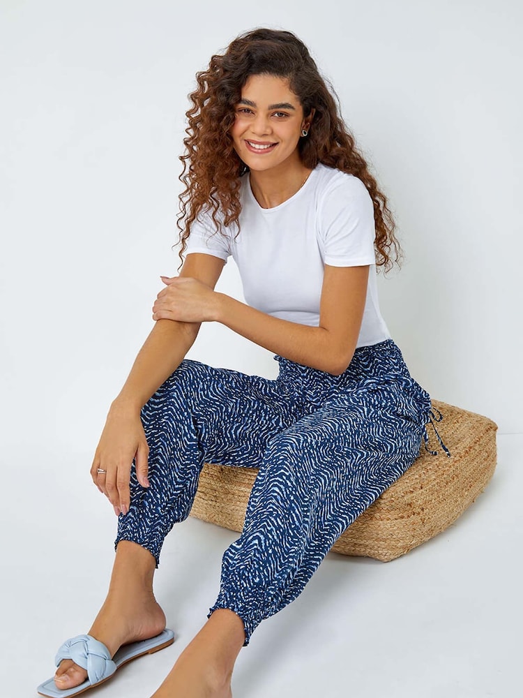Pantalones de harén elásticos con estampado de ondas de Roman - Imagen 1 de 5 Pantalones de harén elásticos con estampado de ondas de Roman - Imagen 1 de 5