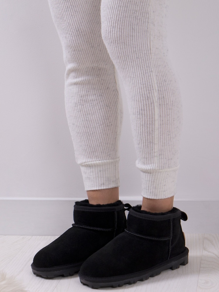 Just Sheepskin™ Black Ladies Mini Grace Sheepskin Boots - Image 1 of 5