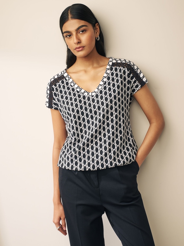 Black/White V-Neck Bubble Hem Top - Image 1 of 5