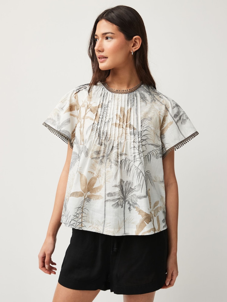 Ecru Palm Print Short Sleeve Pleat Front Blouse - Image 1 of 6 Ecru Palm Print Short Sleeve Pleat Front Blouse - Image 1 of 6
