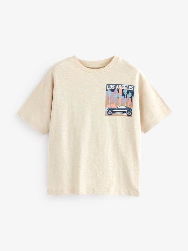 Creme - Kurzärmeliges T-Shirt mit Grafikprint in Relaxed-Fit (3–16 J.) - Bild 1 von 3 Creme - Kurzärmeliges T-Shirt mit Grafikprint in Relaxed-Fit (3–16 J.) - Bild 1 von 3