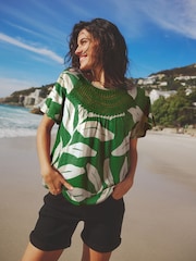 Green Leaf Short Sleeve Crochet Bubblehem Printed Top - Image 1 of 6