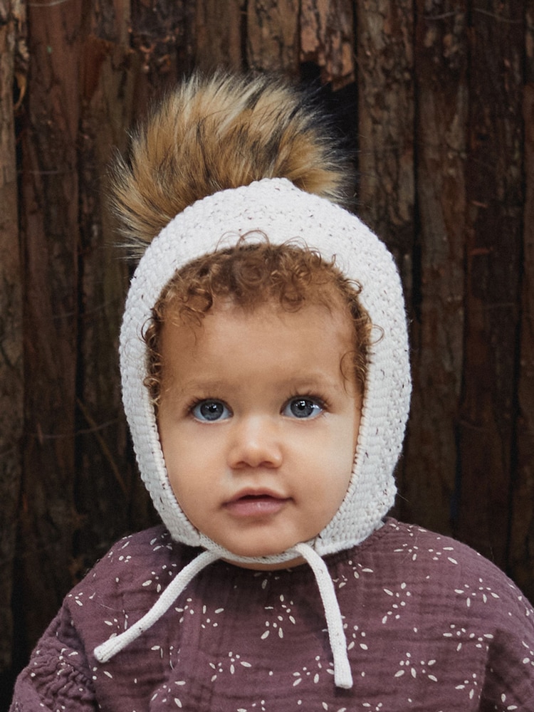 The Little Tailor Baby Pom Pom Textured Knitted 100% Cotton Hat - Image 2 of 3 The Little Tailor Baby Pom Pom Textured Knitted 100% Cotton Hat - Image 2 of 3