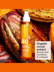 Clarins Glowing Sun Oil High Protection SPF30 150ml - Image 4 of 5