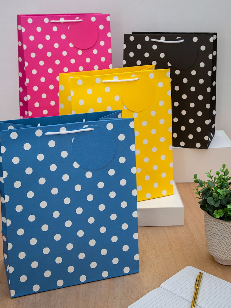 Hallmark Pink Set of 4 Large Gift Bags In Polka Dot Designs - Image 1 of 3