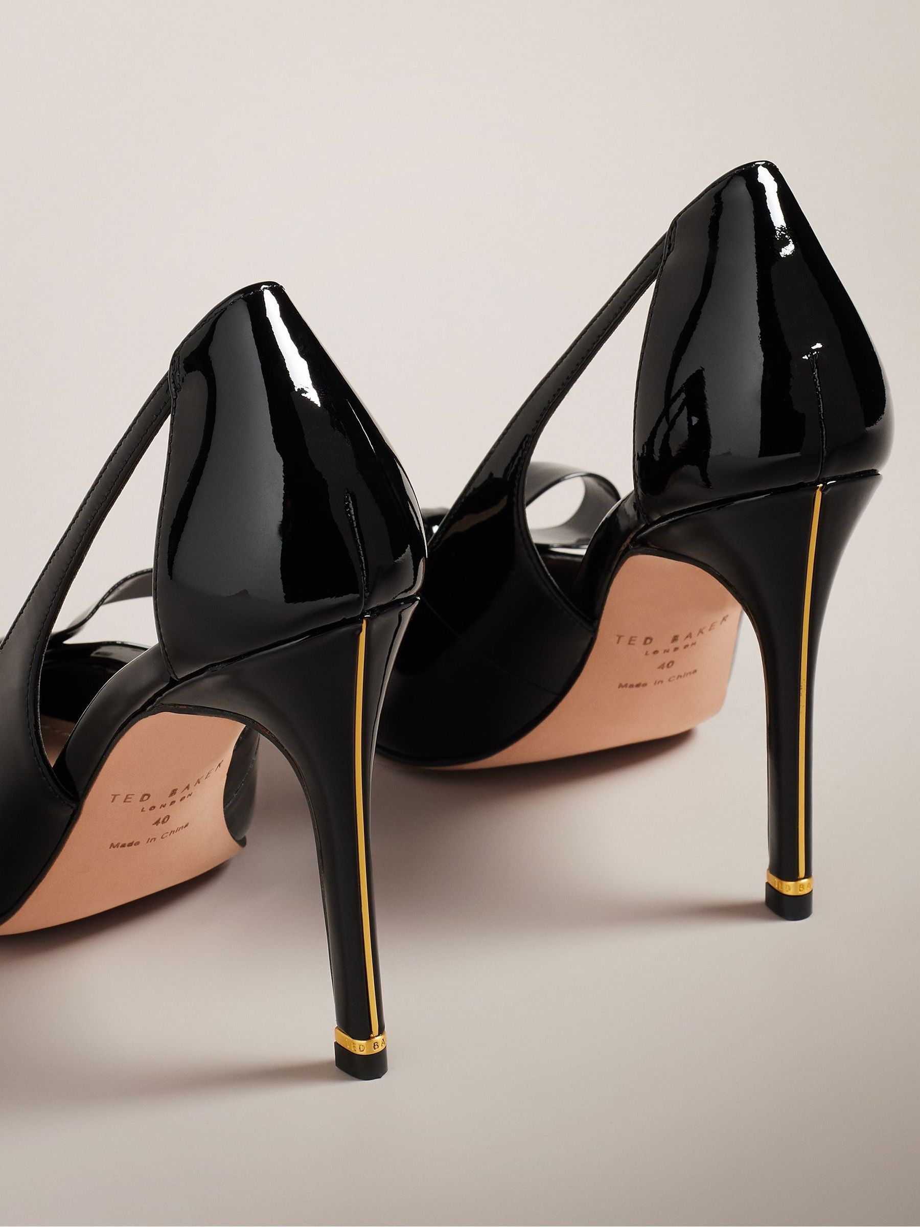 Buy Ted Baker Black Orliney Patent Bow 100mm Cut Out Detail Court Shoes from Next Luxembourg