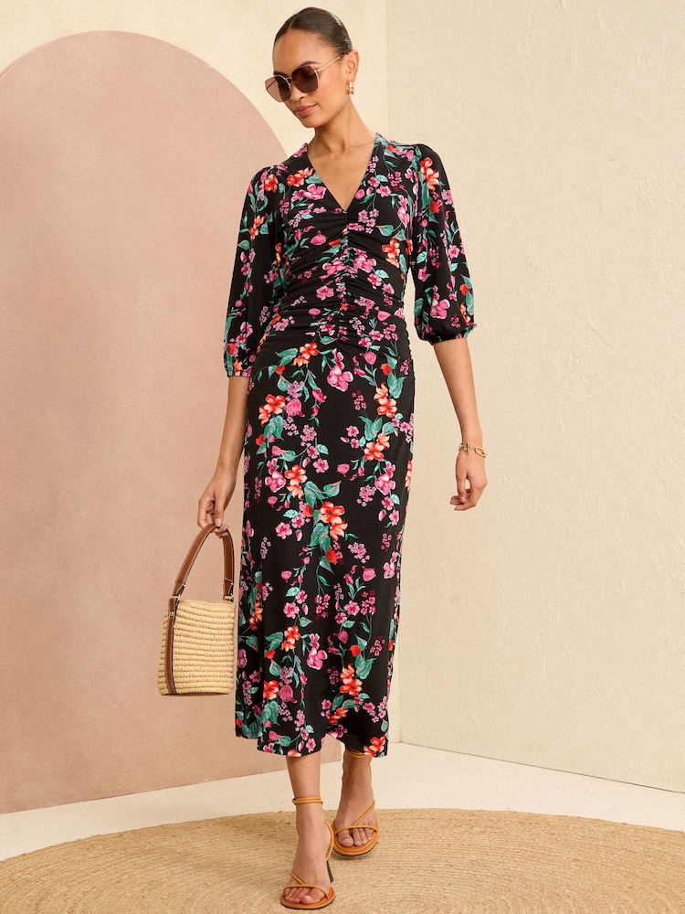 Love & Roses Black Floral Ruched 3/4 Sleeve Jersey Midi Dress - Image 1 of 4 Love & Roses Black Floral Ruched 3/4 Sleeve Jersey Midi Dress - Image 1 of 4
