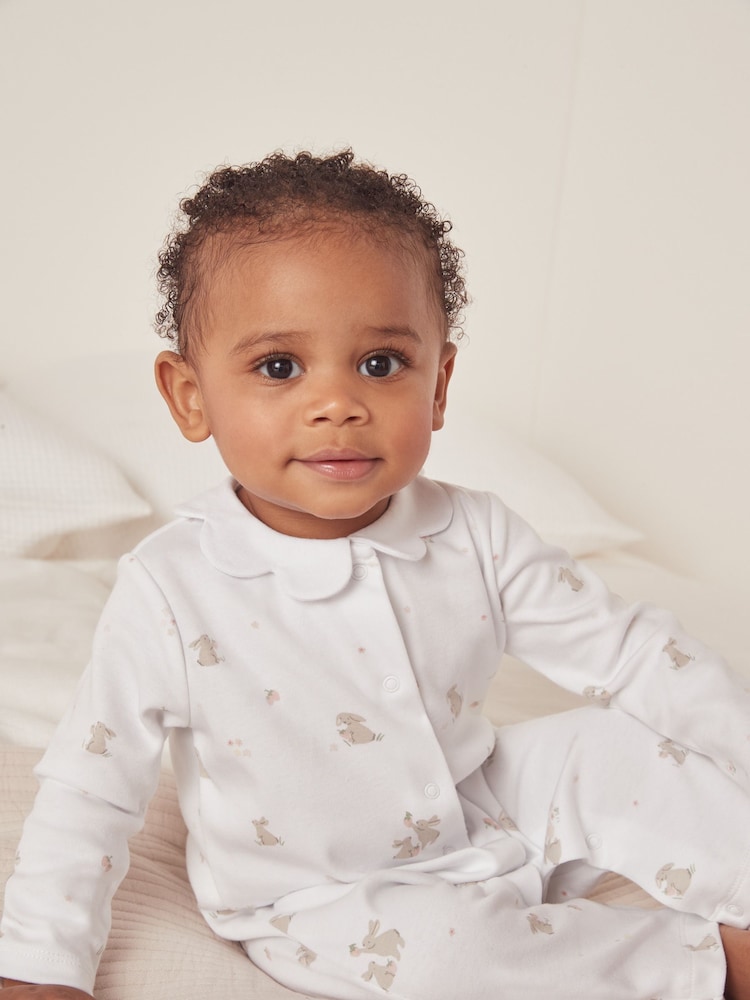 The White Company 100% Cotton Scallop Collar Hoppy Bunny White Sleepsuit - Image 1 of 4 The White Company 100% Cotton Scallop Collar Hoppy Bunny White Sleepsuit - Image 1 of 4