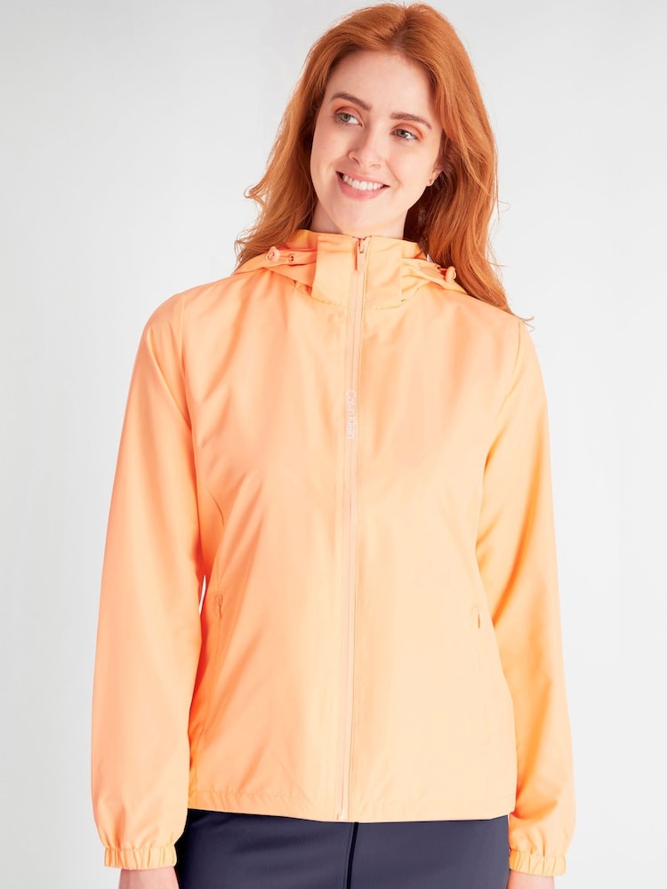 Calvin Klein Golf Melody Hooded Windbreaker Orange Jacket - Image 1 of 8 Calvin Klein Golf Melody Hooded Windbreaker Orange Jacket - Image 1 of 8
