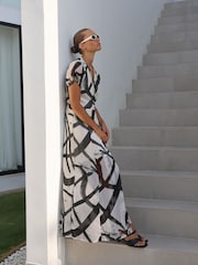 Religion White The Dusk Wrap Dress With Cap Sleeve in Abstract Print - Image 1 of 4