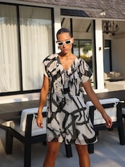 Religion White Spark Mini Dress With Tiered Skirt in Abstract Print - Image 1 of 7