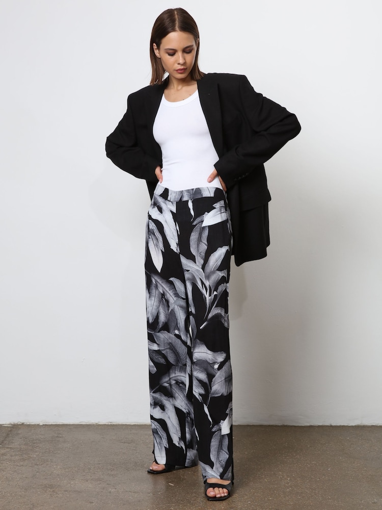 Religion Black Wide Leg Trousers in Botanic Print in Crepe - Image 1 of 7