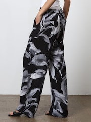 Religion Black Wide Leg Trousers in Botanic Print in Crepe - Image 3 of 7
