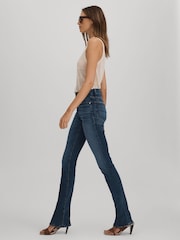 Good American Good American Distressed Bootcut Jeans - Изображение 1 из 5