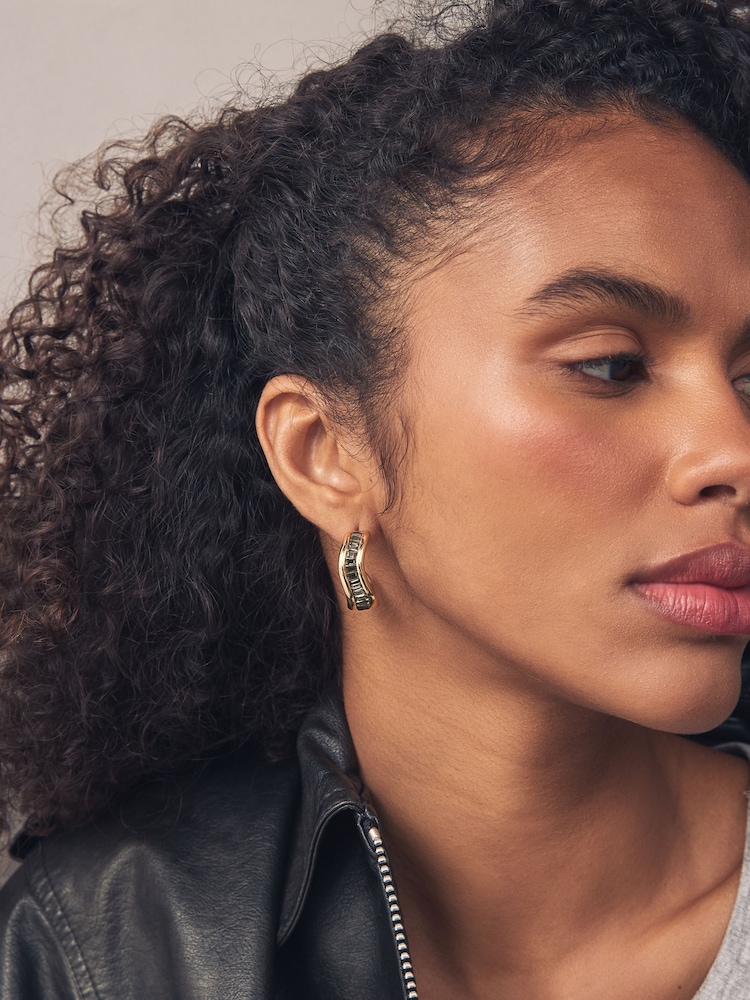 Gold Tone Wave Baguette Stone Earrings - Image 2 of 3