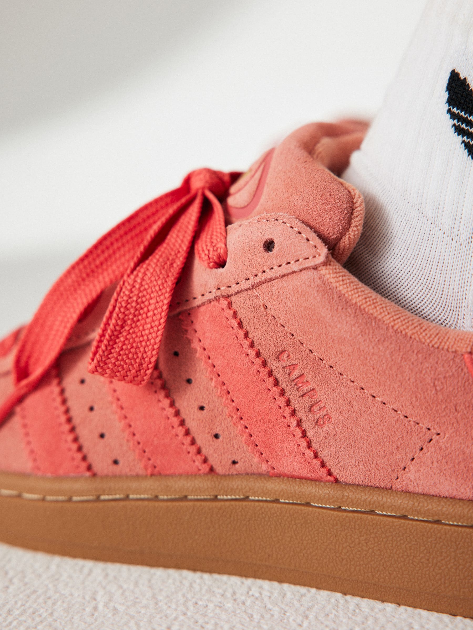 Pink high top adidas sale