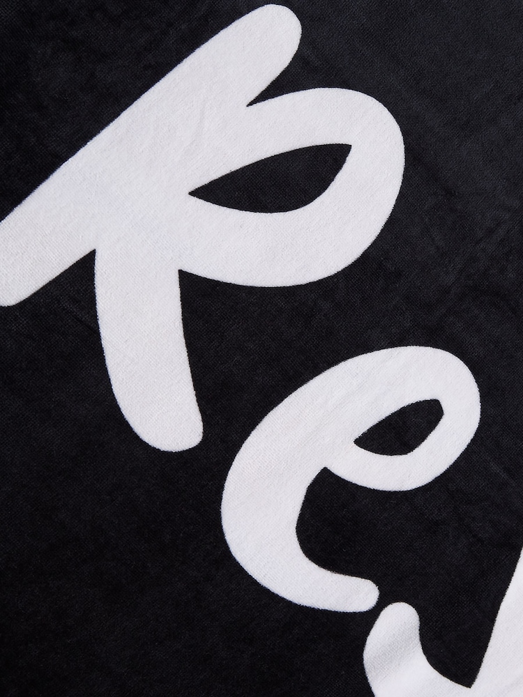 Catherine Lansfield Black 100% Cotton Reserved Extra Long Beach Towel - Image 4 of 4