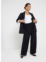 River Island Black Petite Wide Leg Pleated Clean Trousers - Image 1 of 6