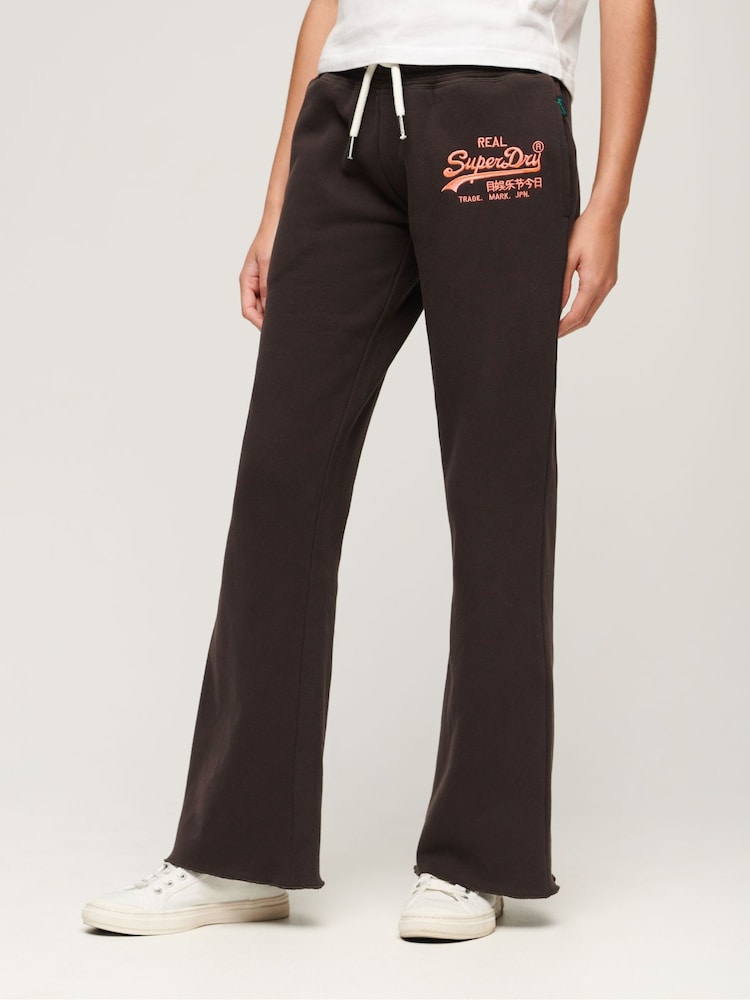 Superdry Brown Neon Vintage Logo Low Rise Flare Joggers - Image 1 of 4