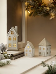Set of 3 White Light Up Ceramic House Ornaments - Image 1 of 6
