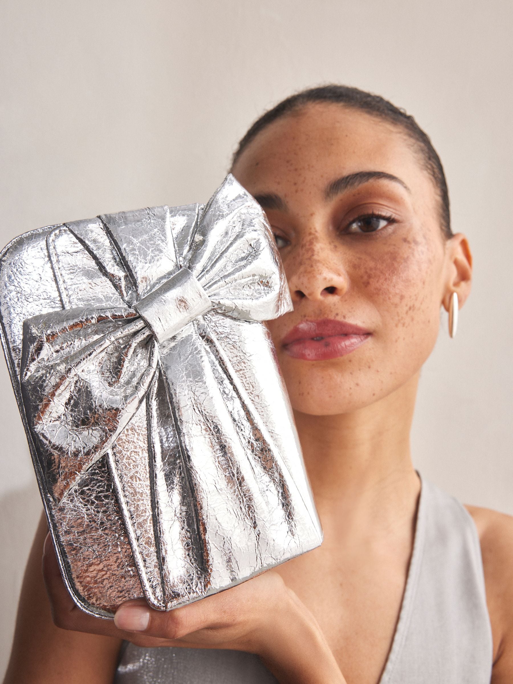 Silver Bow Clutch Bag