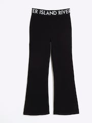 River Island Black Girls Deep 100% Cotton Waistband Kickflare Trousers - Image 1 of 3